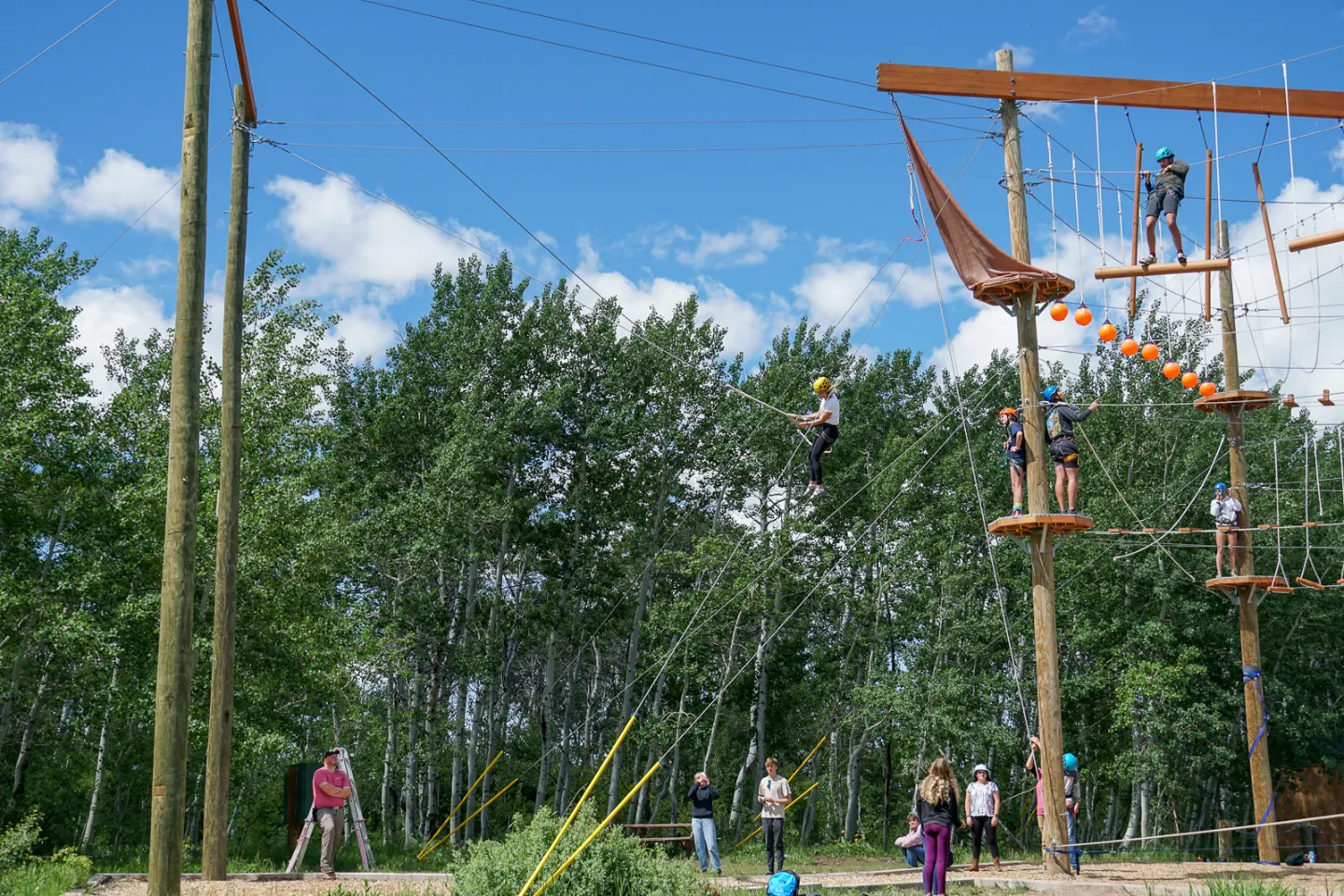OFY campers on the high ropes course at camp near Rexburg, Idaho